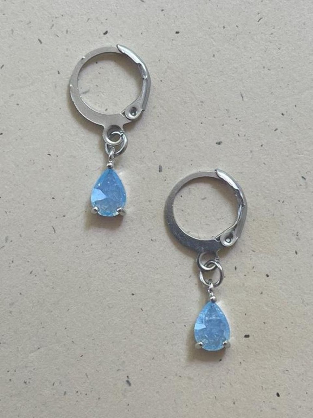 Silver Hoop Earrings with Light Blue Teardrop Stones